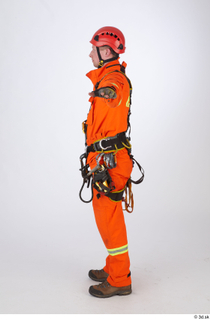 Photos Sam Atkins Fireman in Orange Coveralls standing t poses…